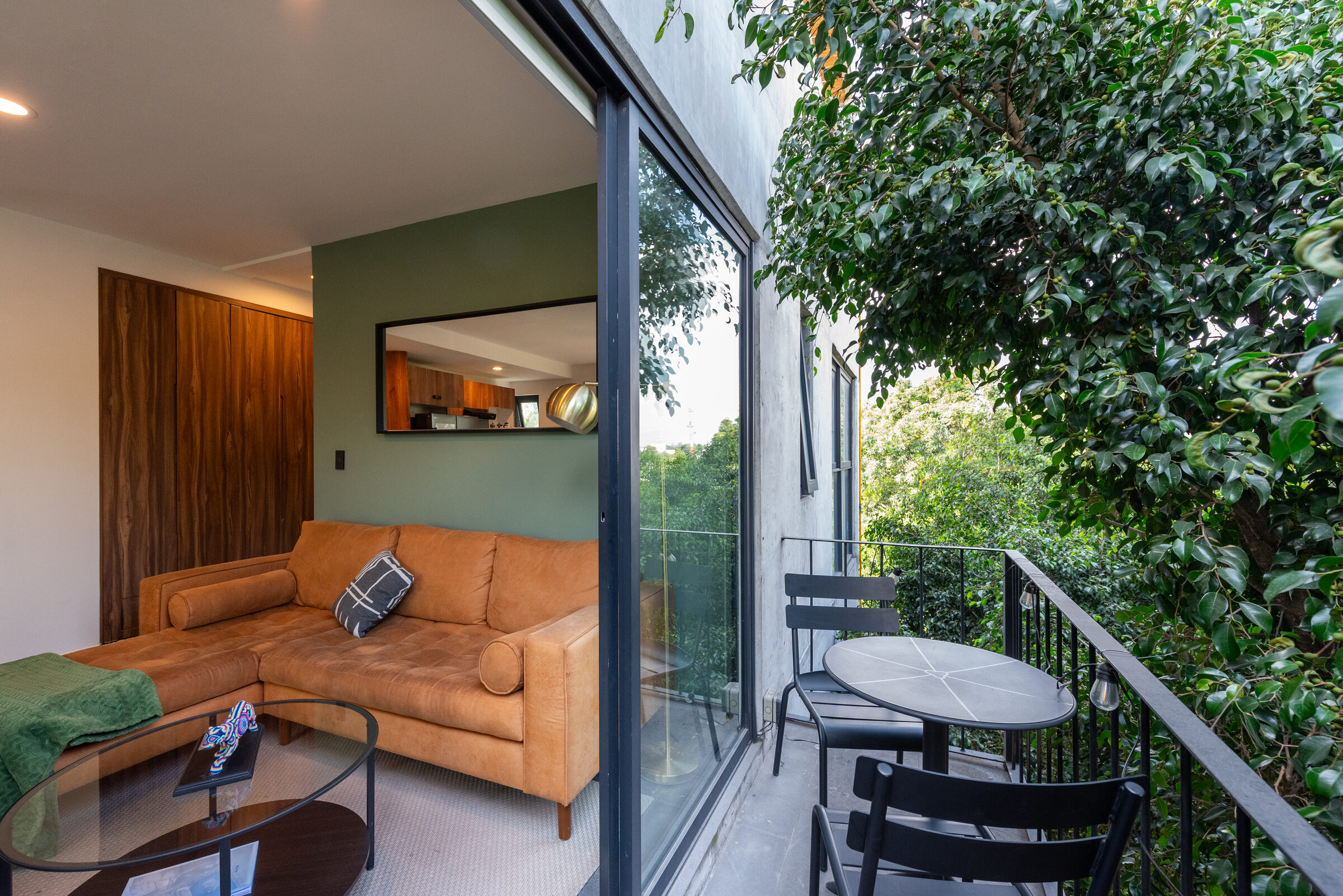 L-balcony with view onto the tree canopy