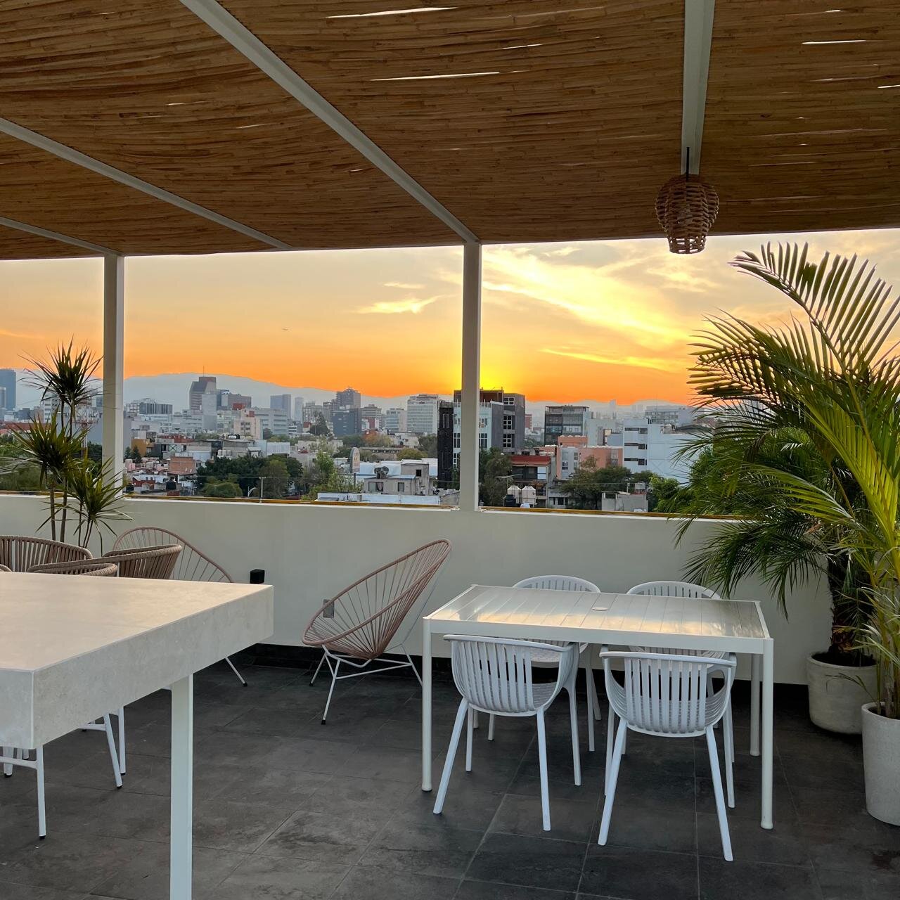 Roma PH · private rooftop at sunset overlooking Mexico City